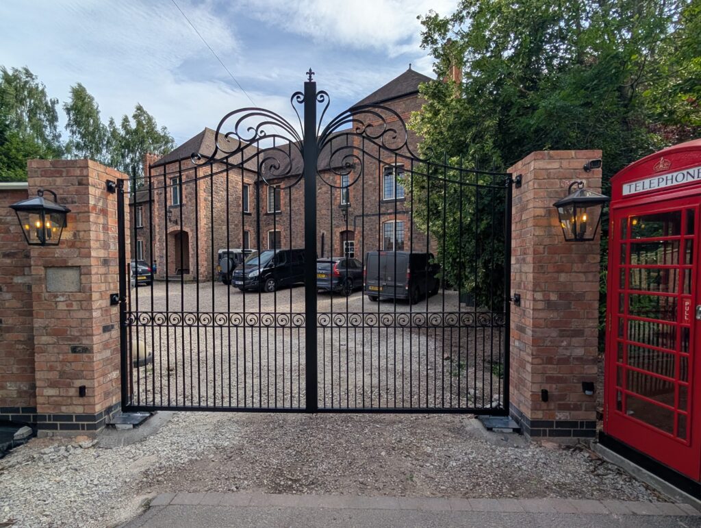 How Much Do Electric Gates Cost in the UK? 2025/2026 Pricing Guide WhatsApp Image 2025 10 31 at 14.22.59 Bespoke hand forged iron driveway gates, full automated system with induction loop and intercom system.
