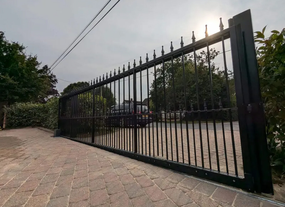 Electric sliding metal driveway gate